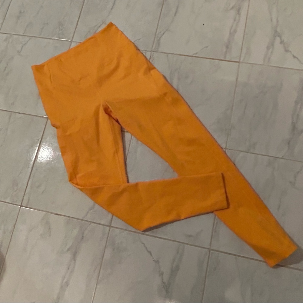 Girlfriend Collective Bright Orange Leggings / tights. Excellent condition